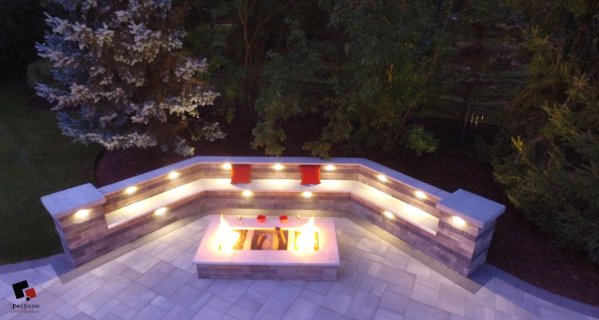 outdoor lighting installation for a paver patio by Pavestone Brick Paving